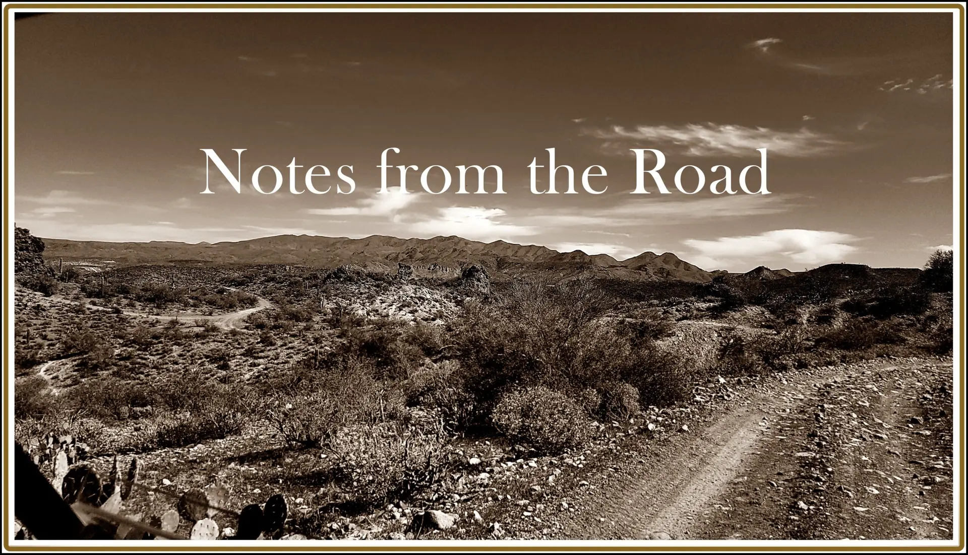 A vintage-style view of a quiet Arizona desert road at sunset, representing the journey of documenting roadside memorials.